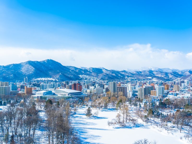 Beautiful architecture building with mountain landscape in winter season Sapporo city Hokkaido Japan